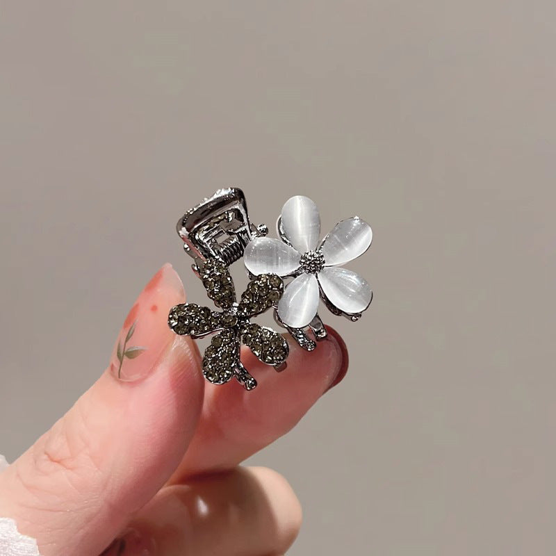 Side view of the floral mini claw clip for bangs and small sections