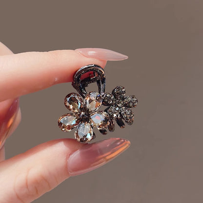 Crystal flower small claw clip shown from an angled front view