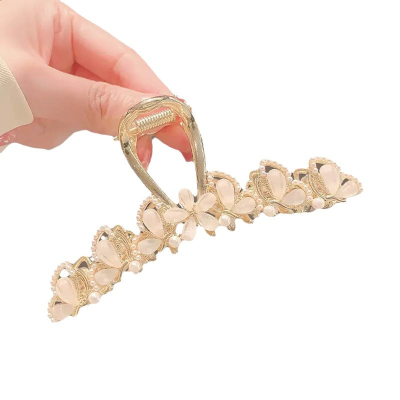 Large Gold Leaf Hair Claw Clip with Jade Flower open claw side view