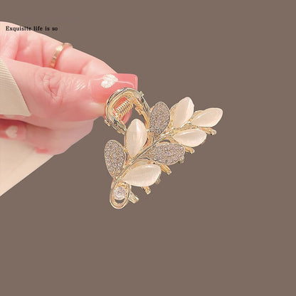 Small decorative leaf hair claw clip for side sections and half-up styling