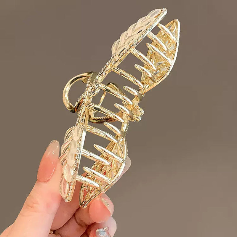 Gold Leaf Hair Claw Clip with White Inlay and Rhinestones side view