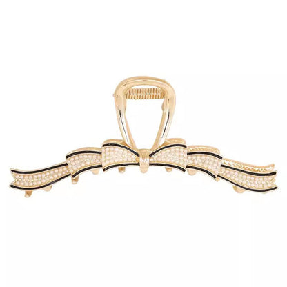 Gold Pearl Bow Hair Claw Clip on white background
