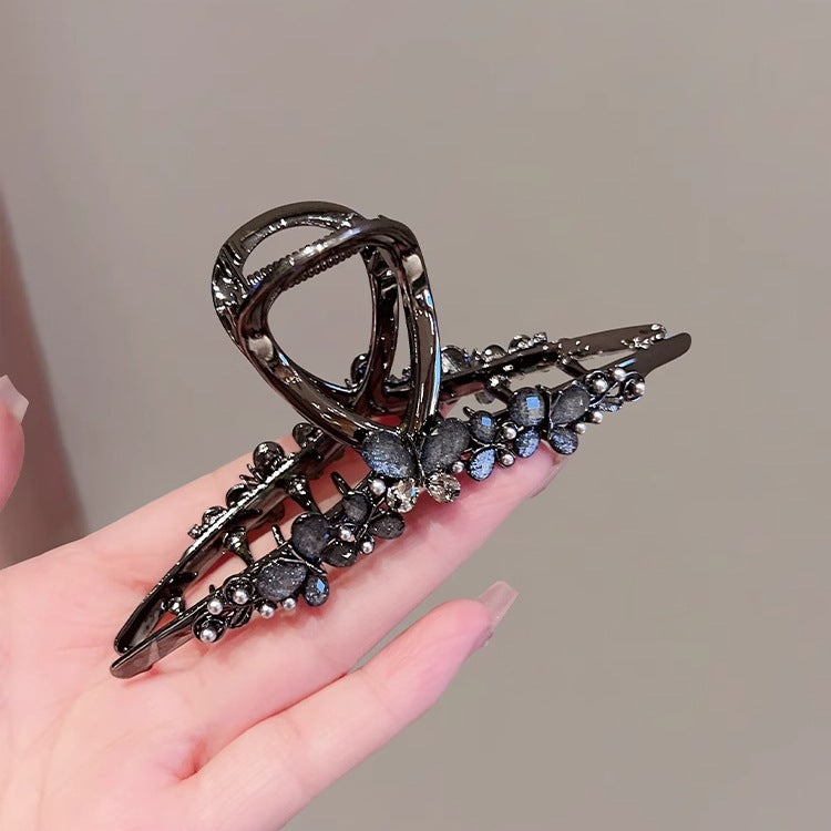 Large Black Butterfly Hair Claw Clip with Pearl Detail open claw side view