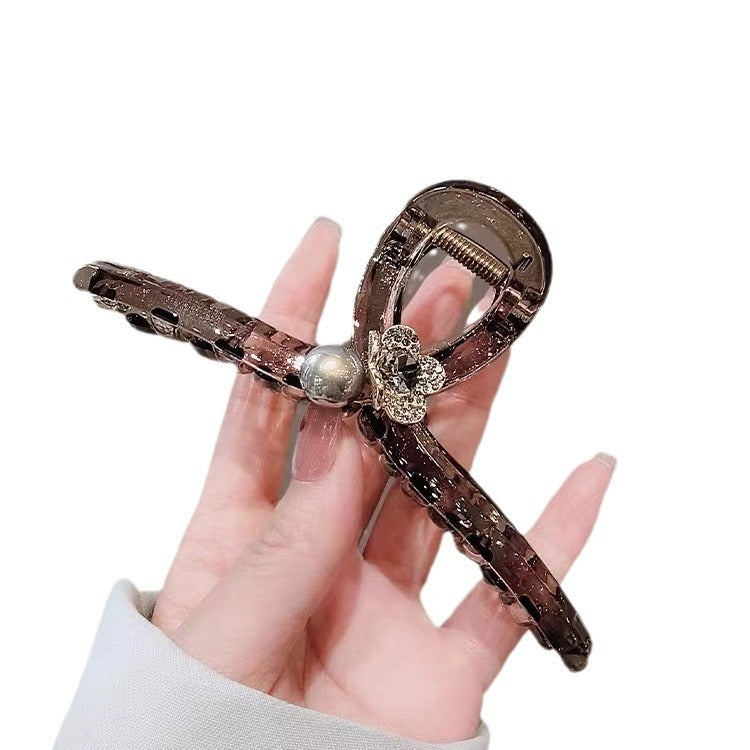 Tortoiseshell Flat Hair Claw Clip with Pearl Flower Charm on white background
